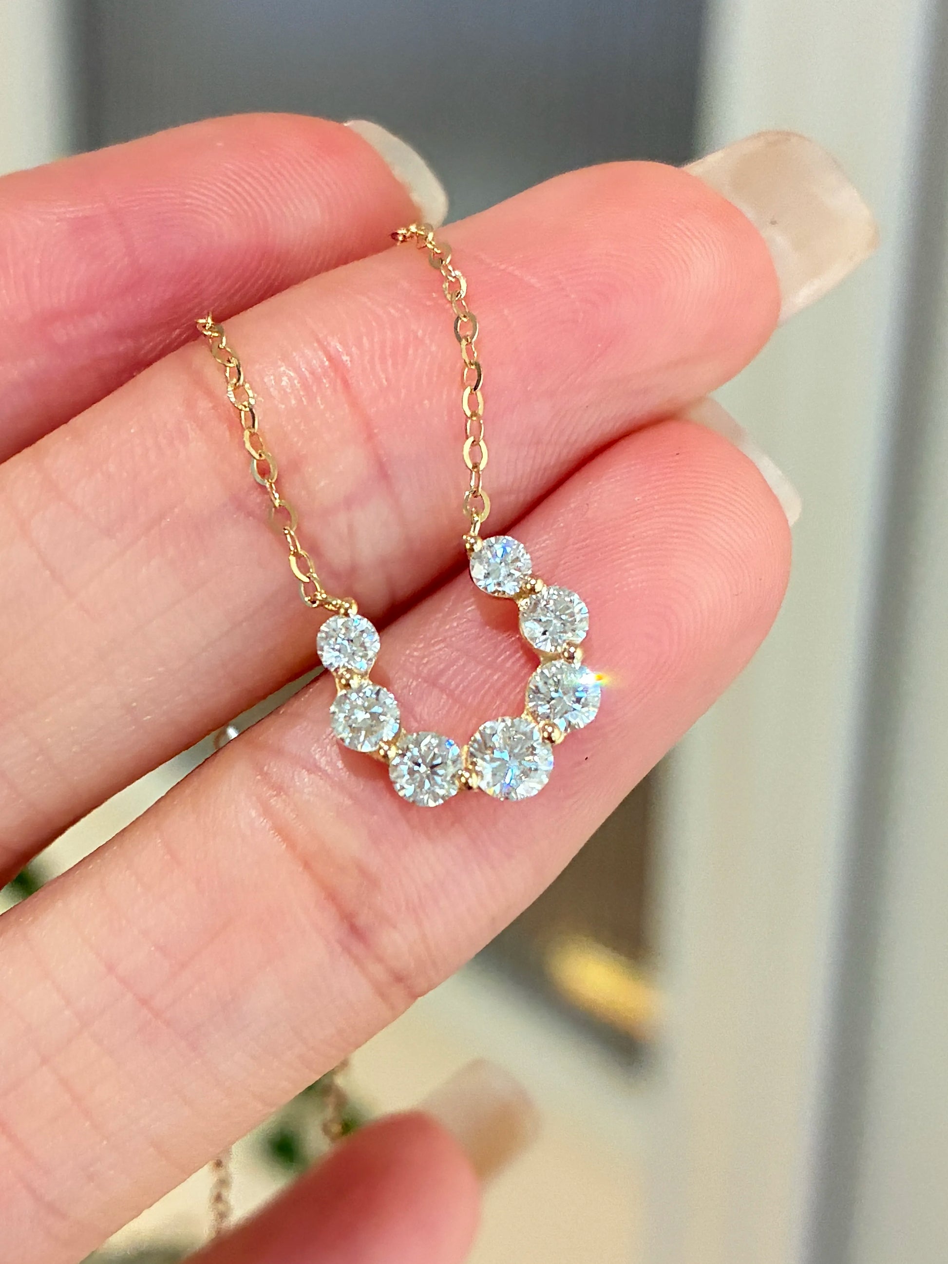 ホースシューモチーフ ダイヤモンドネックレス（合計約0.56ct）